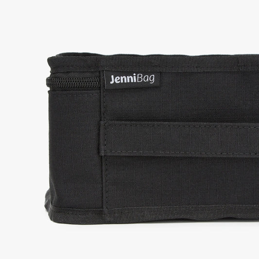 Black bag with a label on a white background