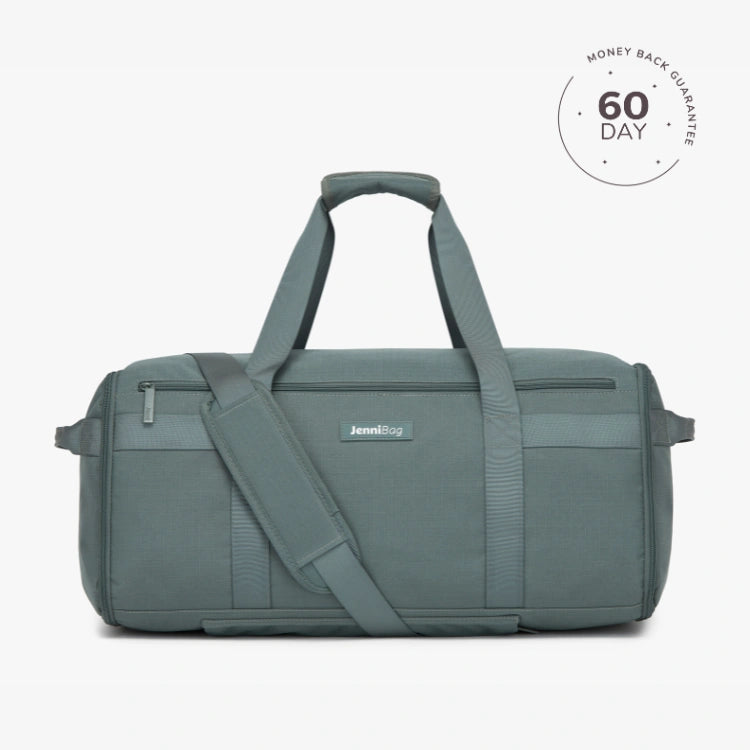 A beige travel duffel bag with multiple compartments and a shoulder strap, displayed against a white background with a '60 DAY' guarantee seal in the top right corner.