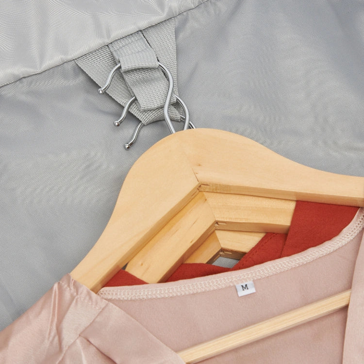 Wooden hangers with red fabric inside a gray garment bag.