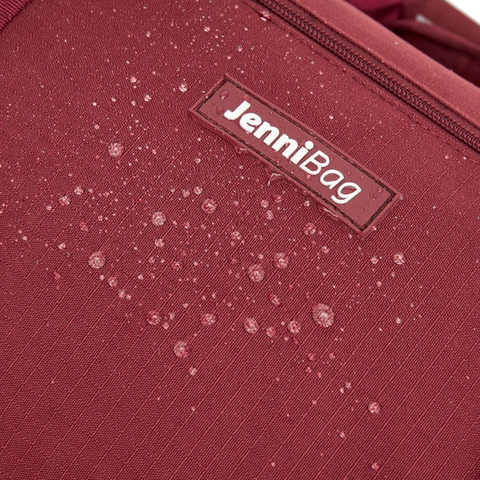Close-up of a red bag with a label