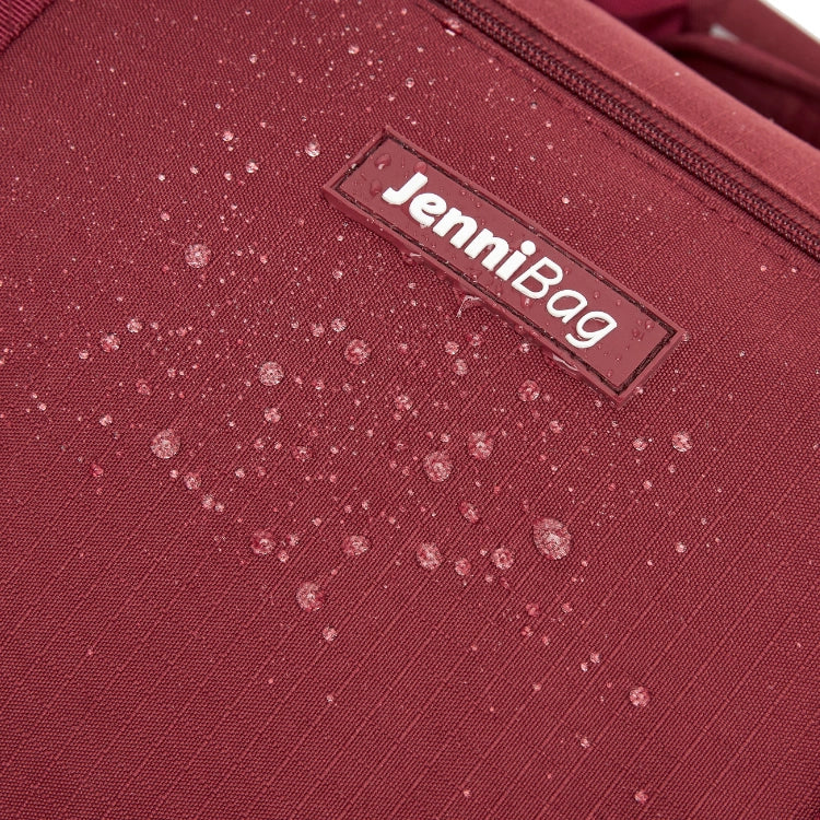 Close-up of a red bag with a label