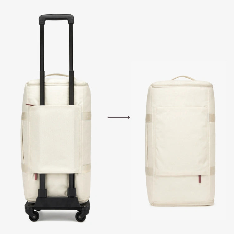 White rolling suitcase and backpack side by side on a plain background