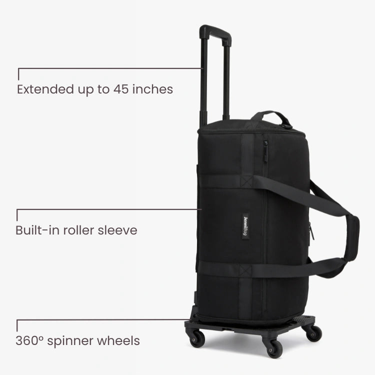 Black rolling suitcase with extended handle and 360-degree spinner wheels on a white background.
