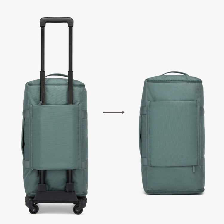 Teal rolling suitcase and backpack on a white background