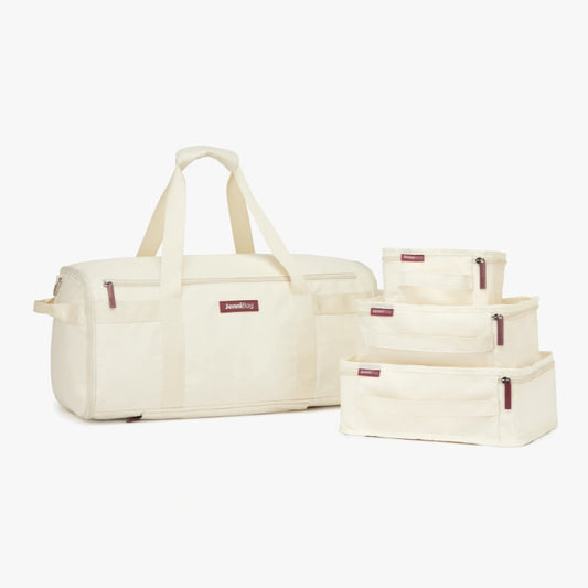 Set of cream-colored bags and containers on a white background