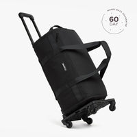 Black rolling duffel bag on a white background with a brand logo and '60 Day Money Back Guarantee' badge.