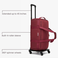Red suitcase with extended handle, built-in roller sleeve, and 360-degree spinner wheels on a white background.