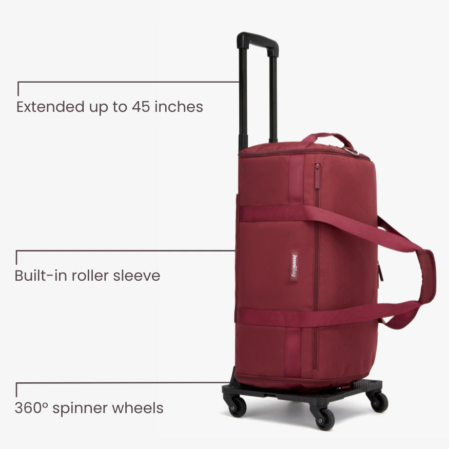 Red suitcase with extended handle, built-in roller sleeve, and 360-degree spinner wheels on a white background.
