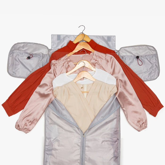 JenniBag opened flat, showing the garment section and main compartment