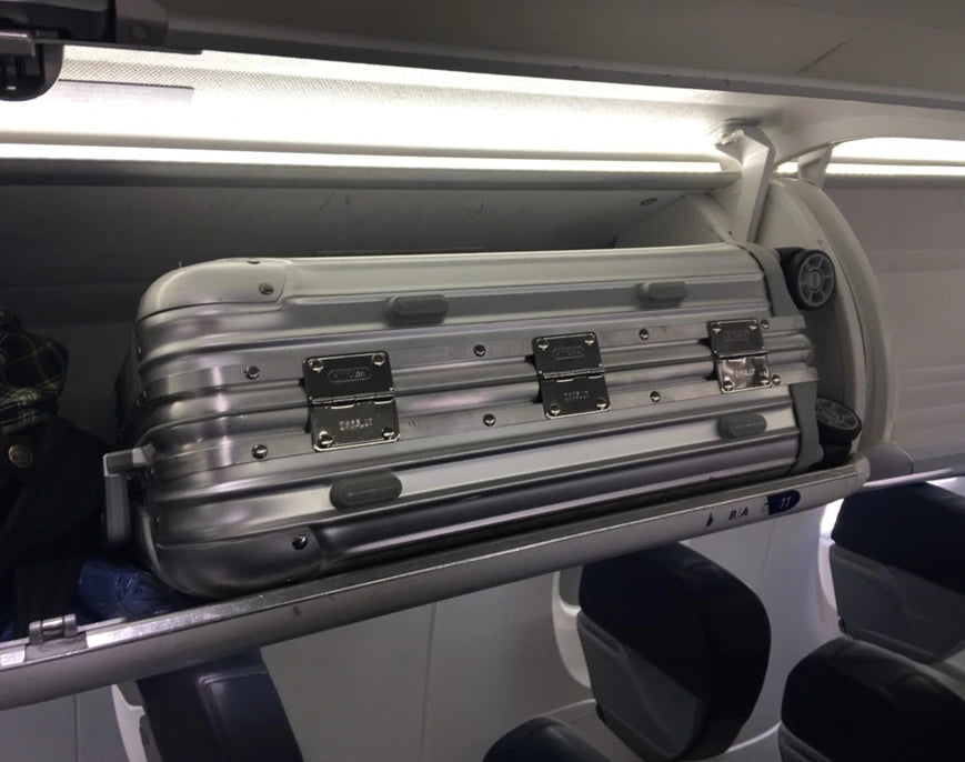 Traditional hard-shell carry-on luggage